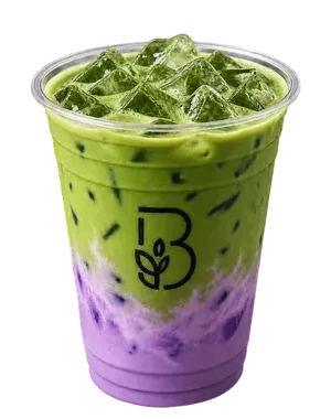 Ube matcha in a clear Beanery cup, green matcha layered over purple ube.